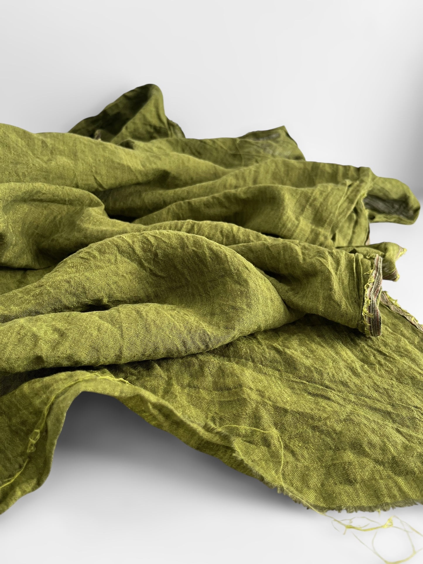 Green fabric on a white background