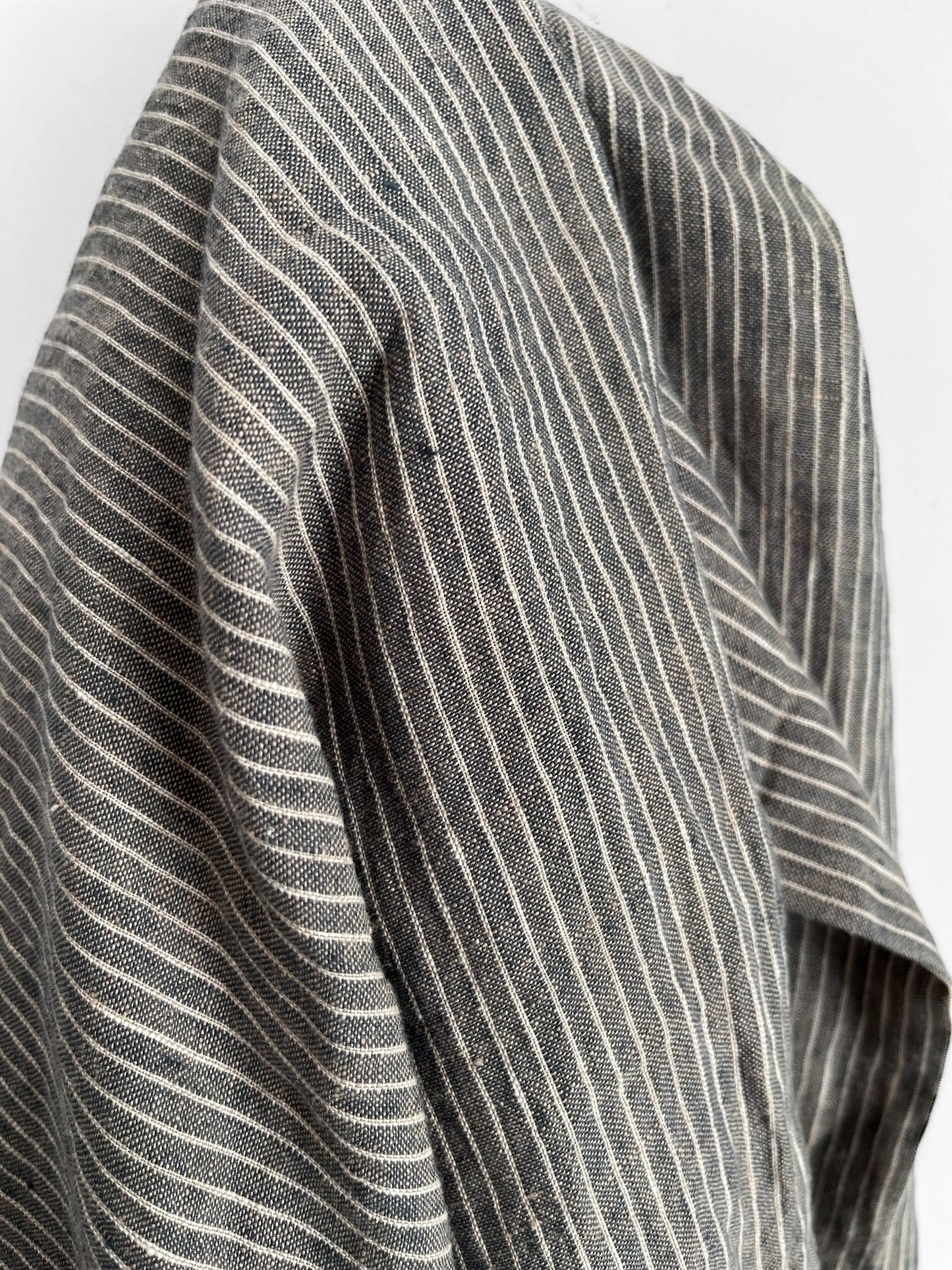 Close-up of a gray and white striped fabric texture