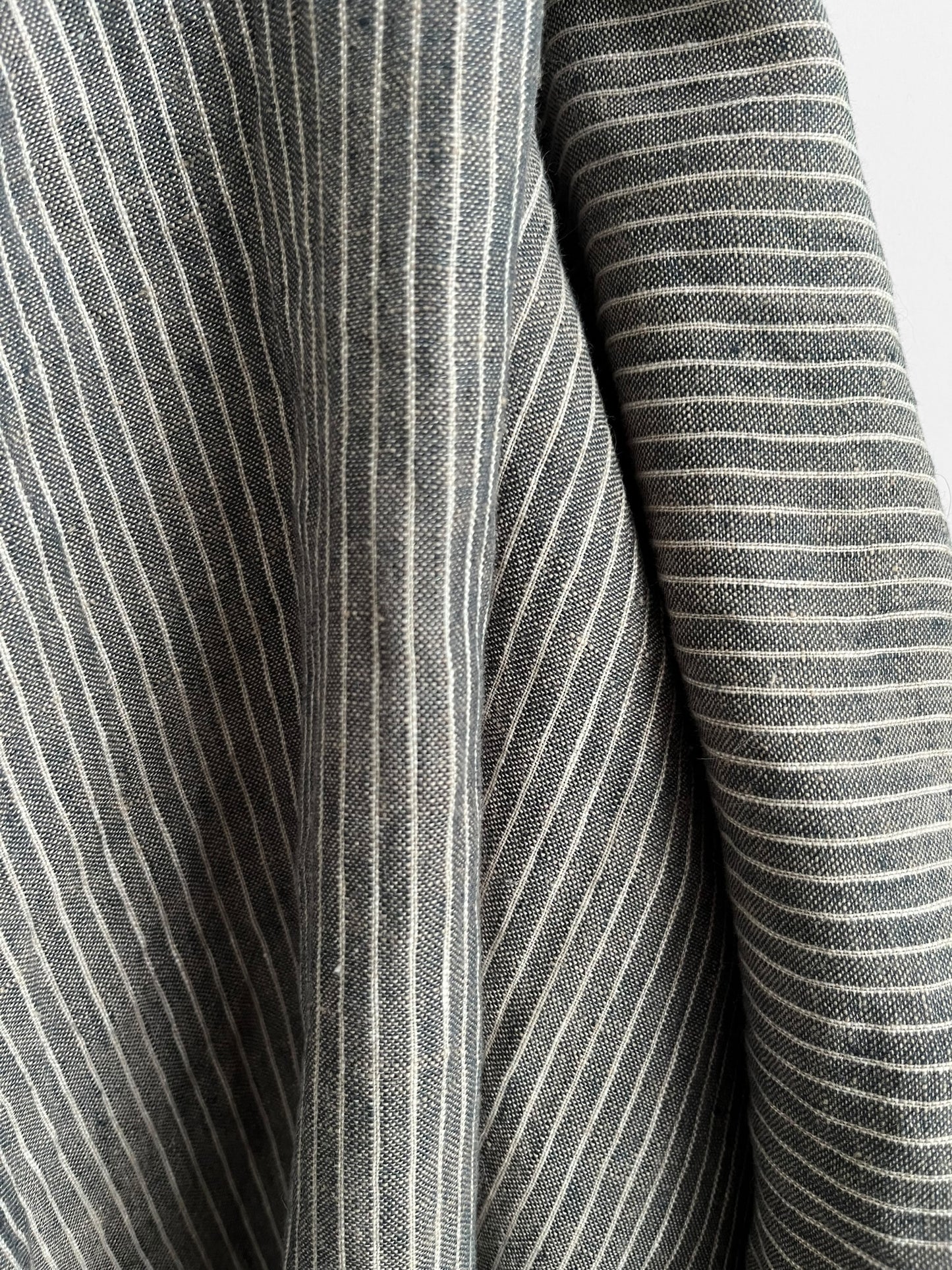 Close-up of denim blue and white striped fabric
