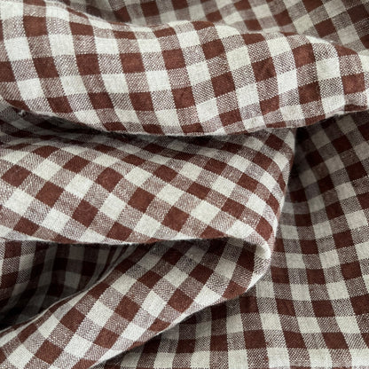 Close-up of brown and natural gingham fabric