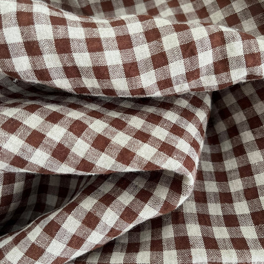 Close-up of brown and natural gingham fabric