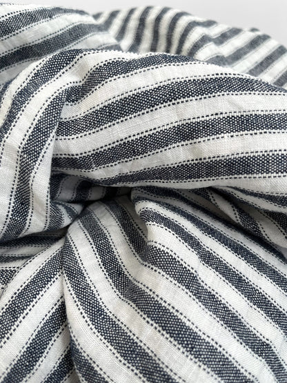 Close-up of navy and white striped fabric