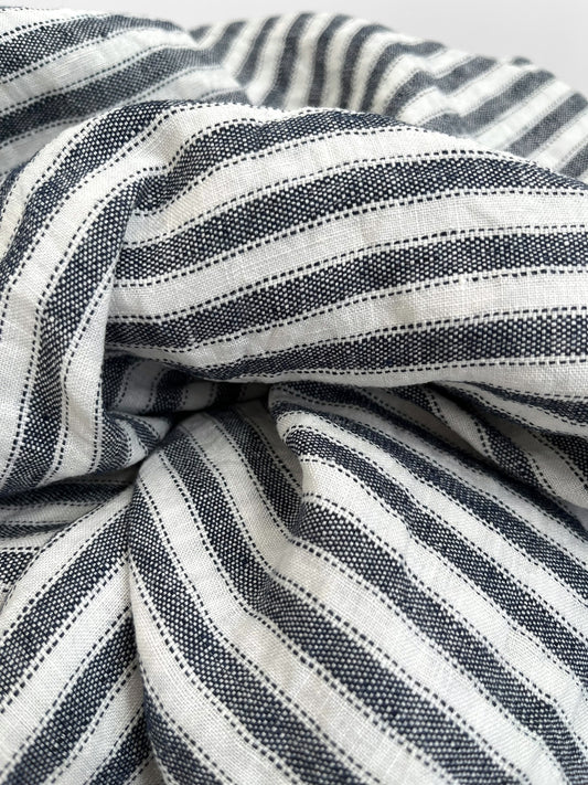 Close-up of navy and white striped fabric
