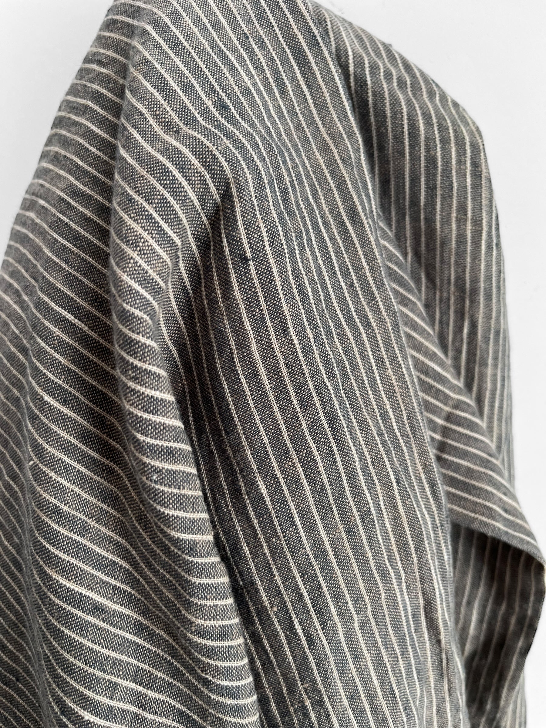 Close-up of a gray and white striped fabric texture